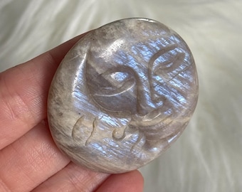 Piedra lunar negra con forma de corazón y rostro, piedra lunar marrón