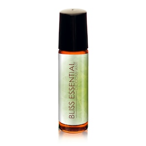 May include: A brown glass roller bottle with a black cap. The label is white with a green geometric pattern and the text "BLISS ESSENTIAL OIL COMPANY".