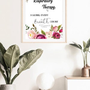 May include: A framed print with a floral border and the text "Respiratory Therapy Making Every Breath Count".