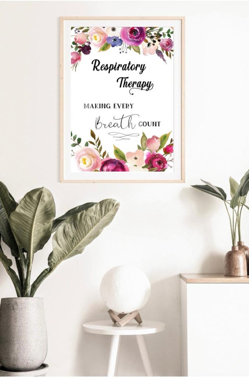 May include: A framed print with a floral border and the text "Respiratory Therapy Making Every Breath Count".