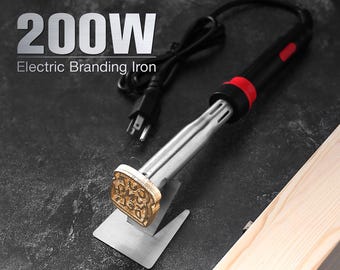 May include: A 200W electric branding iron with a black and red handle, a silver metal shaft, and a brass stamp head featuring a bread-shaped design. The tool includes a black power cord and rests on a silver metal stand.