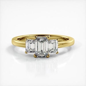 Anillo de compromiso de moissanita de tres piedras de talla esmeralda en oro blanco macizo de 10 quilates o plata de ley
