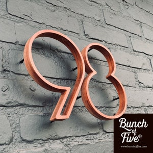 Extraordinary house numbers made from padouk