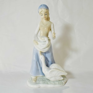 Porcelain Girl with goose Shepherdess collectible figurine vintage