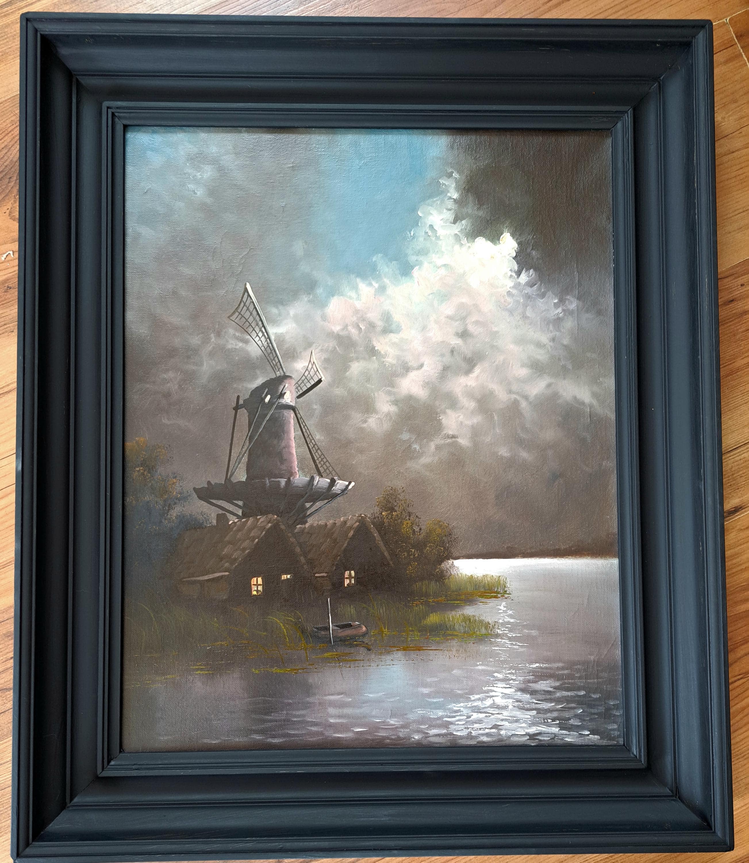 風車と威嚇的な空を描いた、美しく大きな典型的なオランダの風景画