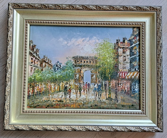 非常に美しいカラフルなパリフランスのシャンゼリゼ通りの凱旋門の中型