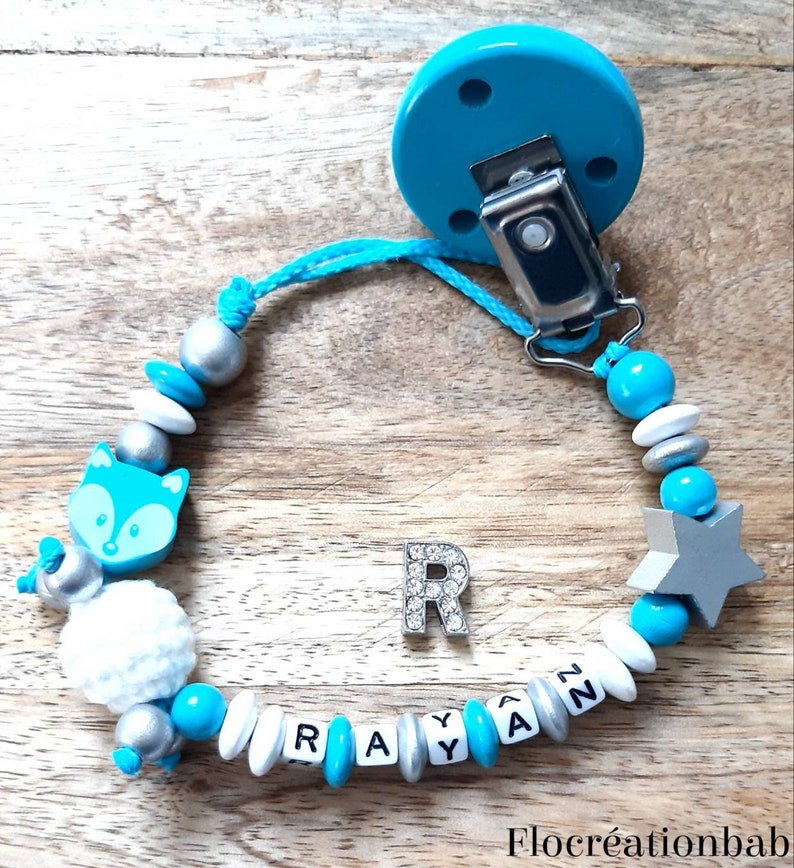 a crochet bead white and silver wood Custom nipple attachment in turquoise blue