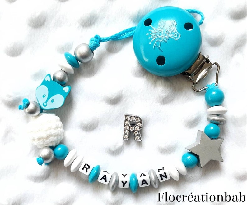 a crochet bead white and silver wood Custom nipple attachment in turquoise blue