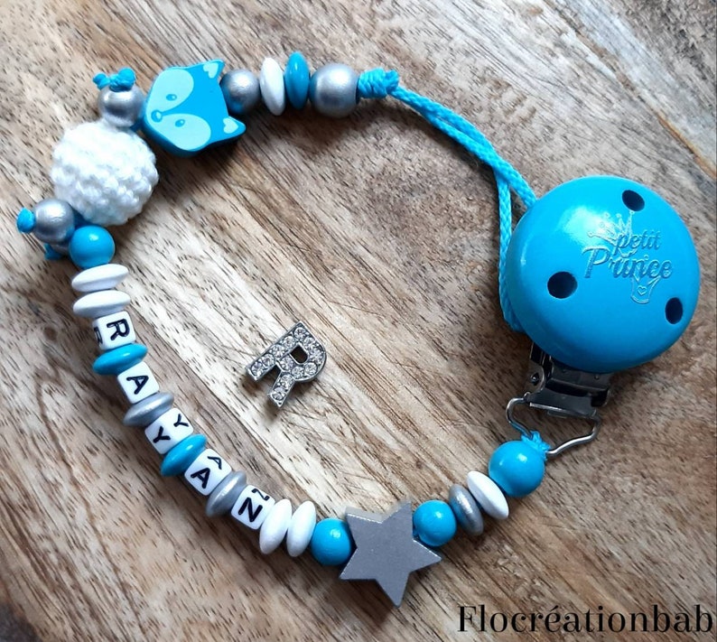 a crochet bead white and silver wood Custom nipple attachment in turquoise blue