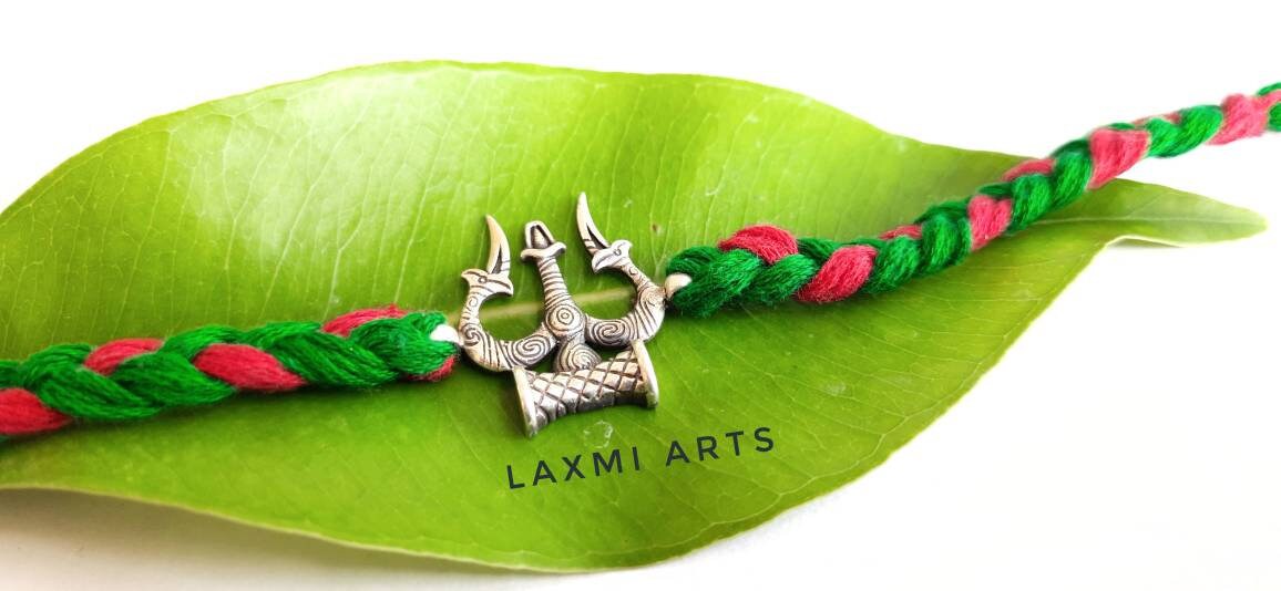 Silver online rakhi jewellery