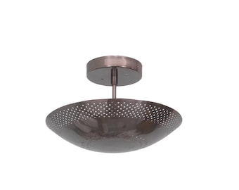 May include: A bronze-colored, semi-flush mount ceiling light fixture. The fixture has a circular base and a bowl-shaped shade with numerous small perforations. The shade is suspended from the base by a short rod.