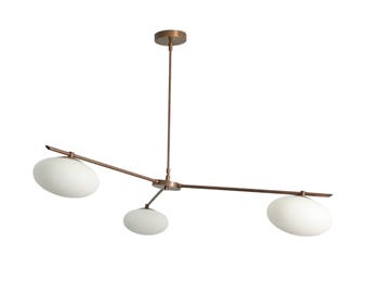 May include: A modern, bronze-colored chandelier with three oval, frosted glass shades. The fixture has a central stem and horizontal arms extending to hold the lights. The design is minimalist and elegant, suitable for various interior styles.