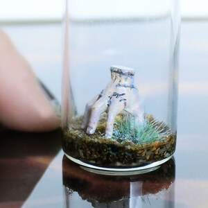 Detail of Thing Miniature Wednesday Addams Family Thing Miniature | Best Creepy Gift in a Bottle for Gothic Home Decor & Horror Movie Art lovers