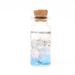 Miniature scene of Warawara creatures set in a sky resin, a tribute to Studio Ghibli's The Boy and the Heron by Stefanie Bonte