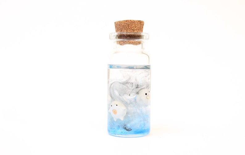 Miniature scene of Warawara creatures set in a sky resin, a tribute to Studio Ghibli's The Boy and the Heron by Stefanie Bonte