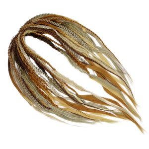May include: A set of brown, blonde, and light brown synthetic hair extensions. The extensions are braided and have a variety of lengths.