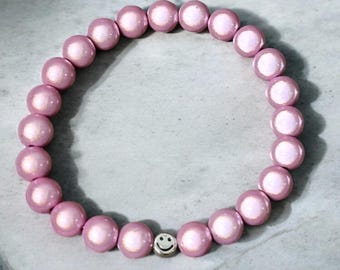 Shimmering 3D bracelet with 10 mm beads, elastic, pink