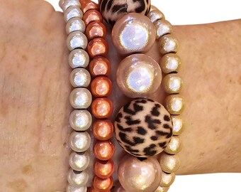 Leo Magic 3D Bracelet Combination, 4 pieces, 6+12+16 mm beads, elastic, colors white/cream/light orange/Leo bead brown