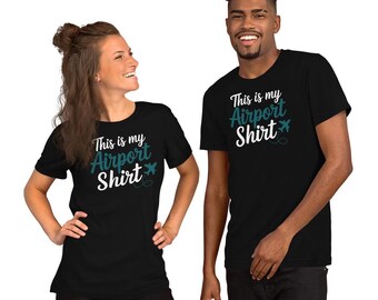 Camiseta unisex de viaje "Esta es mi camiseta de aeropuerto" en verde azulado y blanco.