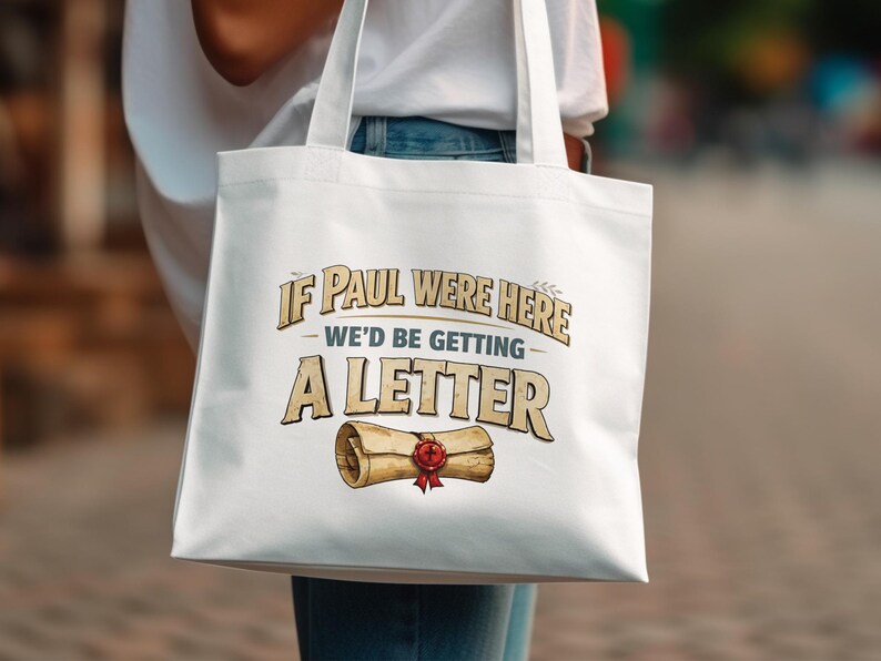 Canvas tote bag with "If Paul Were Here We'd Be Getting A Letter" text and scroll.