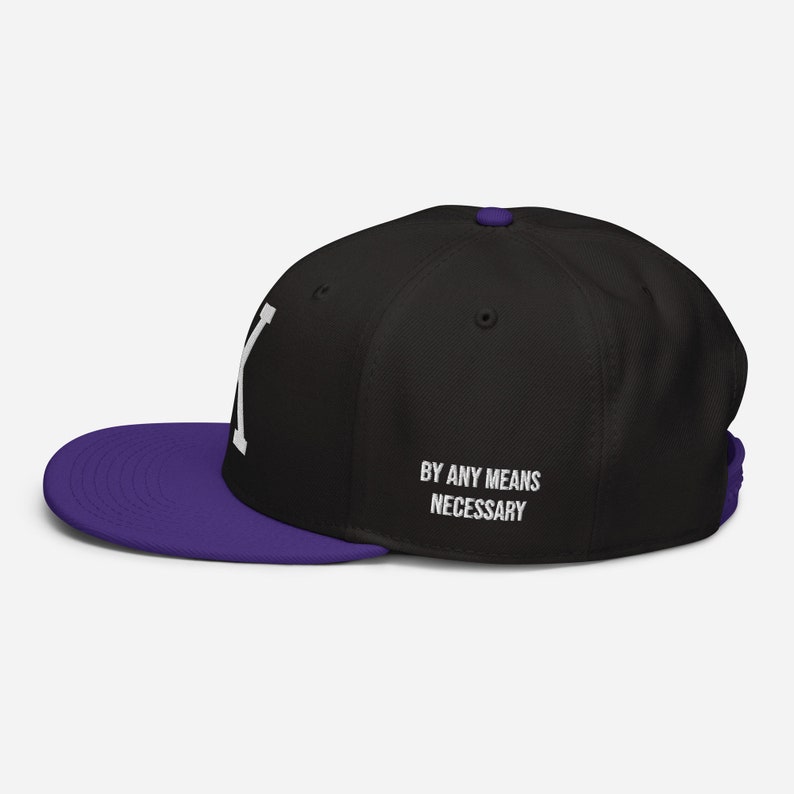 Embroidered Malcolm X "X" Black History Snapback Hat. Honor civil rights activism with this stylish hat featuring Malcolm X’s iconic "X" symbol. Perfect for African American pride, Black empowerment, and hip-hop fashion.