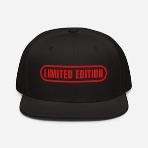 May include: A black and red baseball cap with the text "LIMITED EDITION" in a red oval.