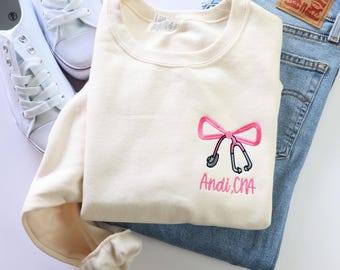 Embroidered Nurse Bow Sweatshirt - Personalized RN Sweatshirt - Custom Crewneck Sweatshirt - Jerzees  - Coquette Bow - Nurse Gift