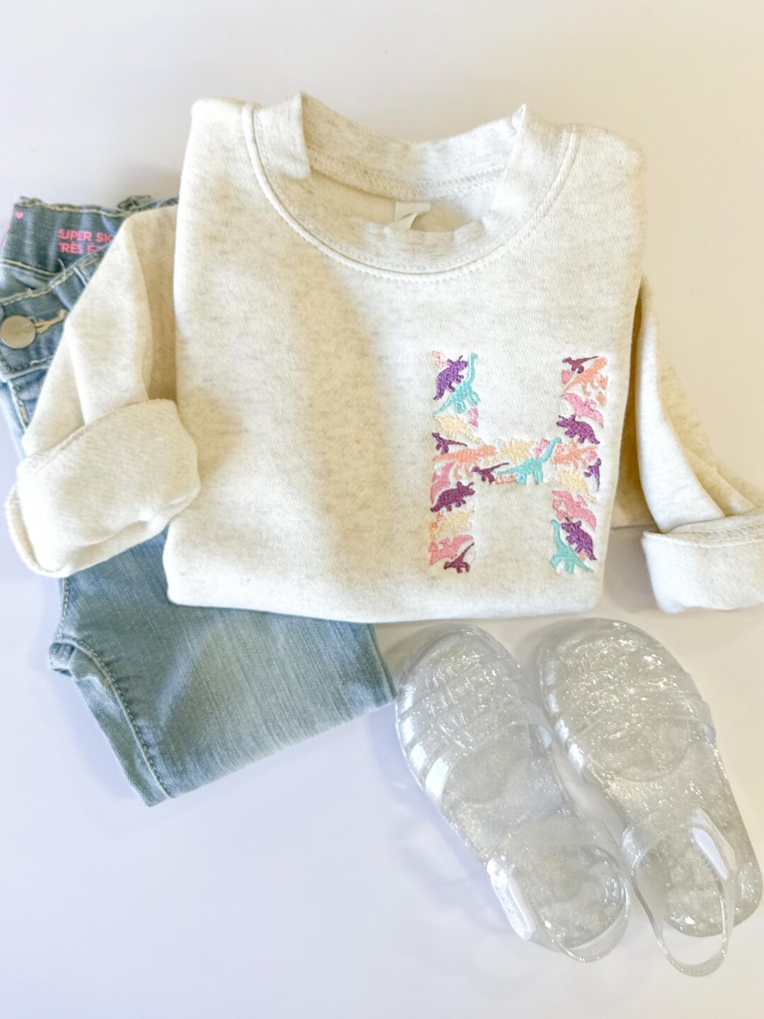 DINOSAUR STAMP FLEECE GIRLS SWEATSHIRT JOGGER SET - OFF WHITE