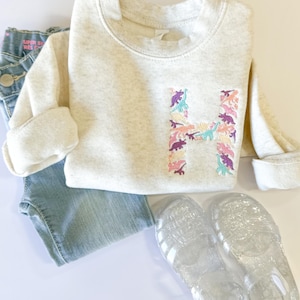 Girls Custom Embroidered Dinosaur Initial Sweatshirt - Personalized Dino Monogram Sweatshirt – Custom Embroidered Cute Dino Crewneck Girls