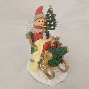 The International Santa Collection Vintage Ceramic Figurine Switzerland The Christkindl 1999 in box