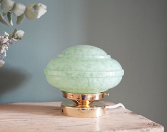 Table lamp in green Clichy glass