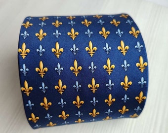 Vintage, designer dark blue silk tie Beaufort Beaufort Tie Rack. Drawing of heraldic lilies. Gift for him or her.