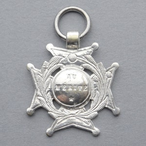 Merit, Antique Pendant.