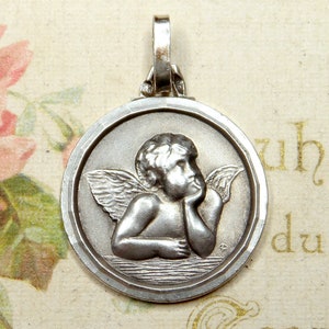 Cherub. Antiker religiöser Anhänger. Französische Silbermedaille.