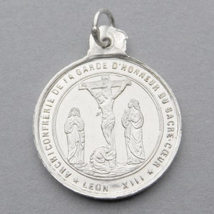 Crucifixion of Jesus. Antique Religious Pendant.