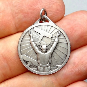 Pilot, antiker Anhänger. Französische Medaille von Fraisse.