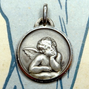 Cherub. Antiker religiöser Silberanhänger. Französische Medaille von Balme.