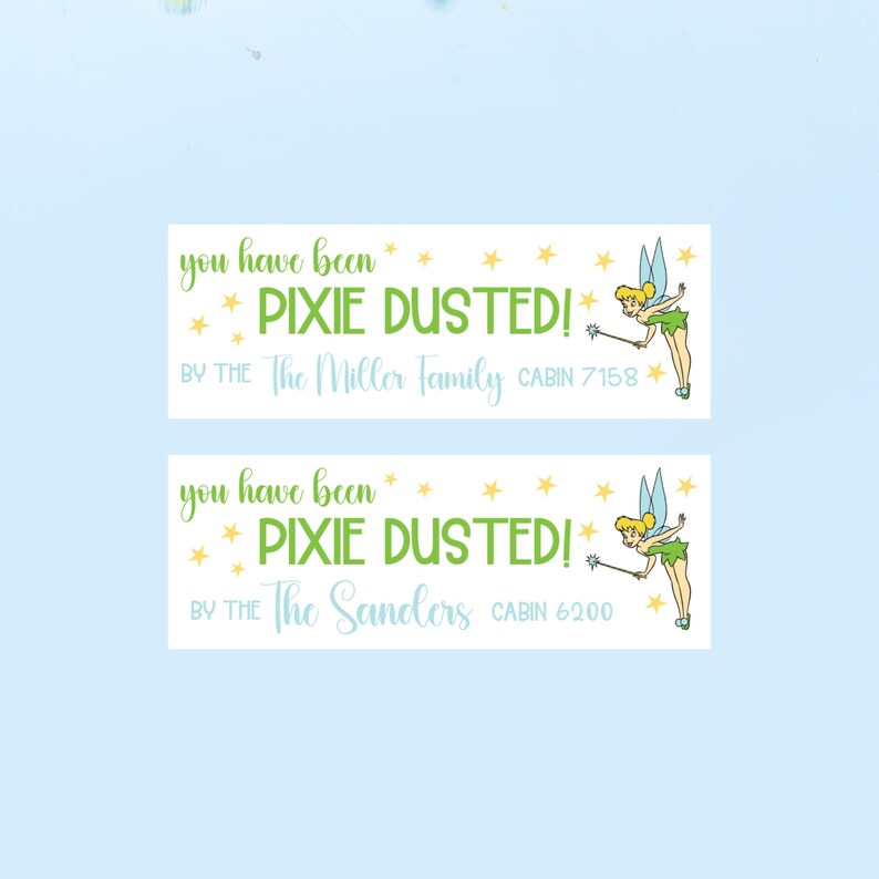 May include: Two printable signs with a Tinkerbell illustration. The signs say "You have been pixie dusted!" with a family name and cabin number below. The first sign says "The Miller Family Cabin 7158" and the second sign says "The Sanders Cabin 6200".