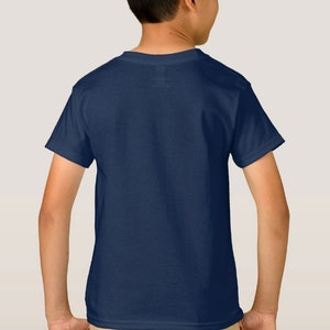 May include: A plain navy blue t-shirt for kids. The shirt has short sleeves and a crew neck.