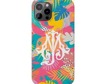 May include: A pink, yellow, blue, and green iPhone case with a white monogram and a tropical leaf pattern.
