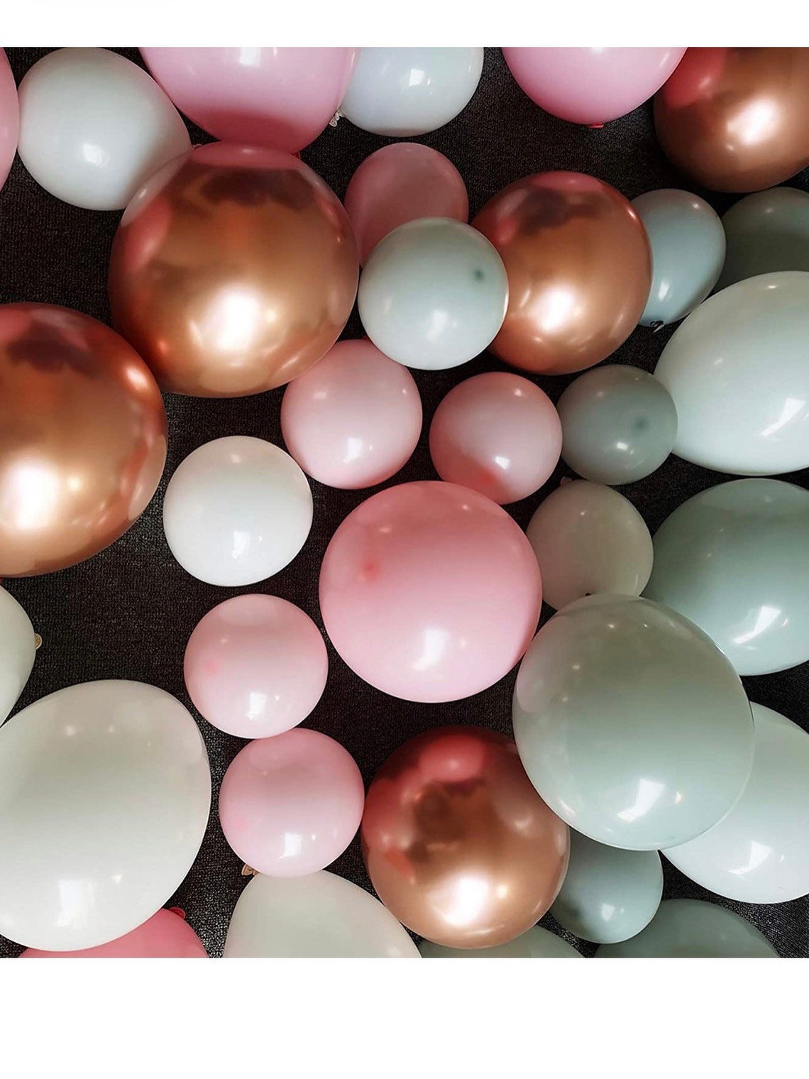 pink and grey balloon arch