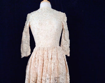 Distressed vintage lace wedding gown