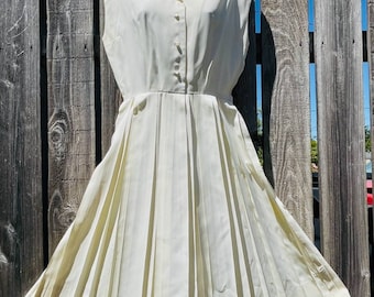 Distressed white pleated dress