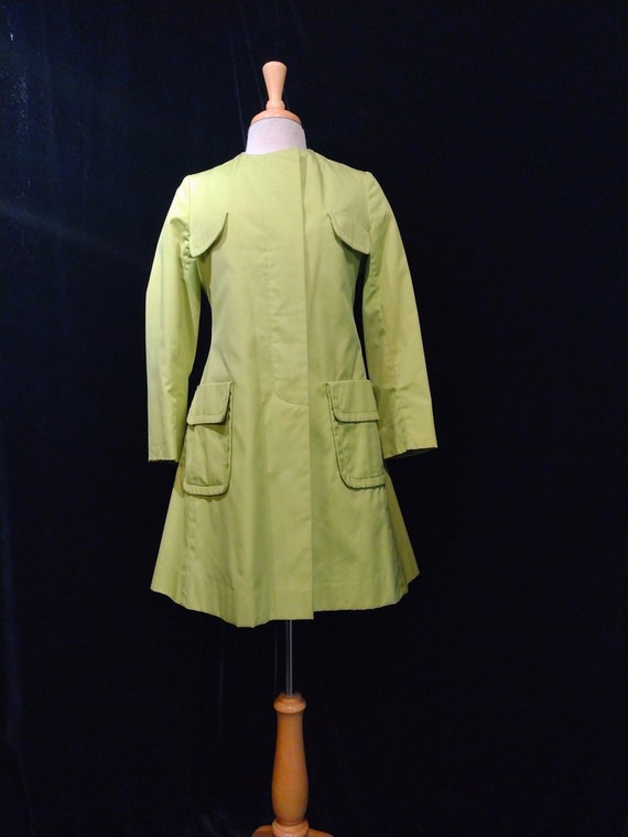 Lime green mod coat by Kaufman Bros Main street