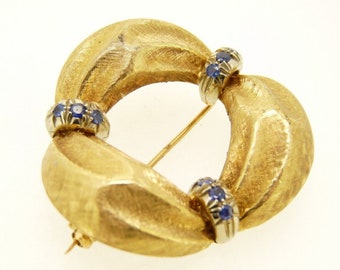 Vintage 1950s brooch in 18 kt solid gold with natural sapphires Made in Italy