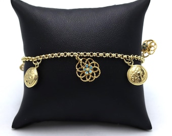Vintage 1990s women's rolo link bracelet made in Italy in 18kt solid gold with charms