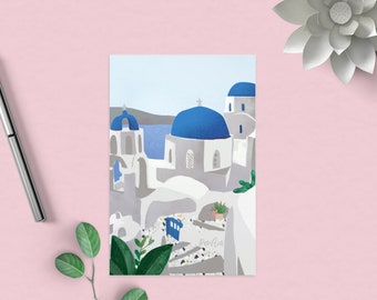 May include: A digital illustration of white buildings with blue domed roofs, set against a blue sky and sea. The buildings are clustered together, creating a sense of community. The illustration is in a minimalist style, with simple lines and shapes.