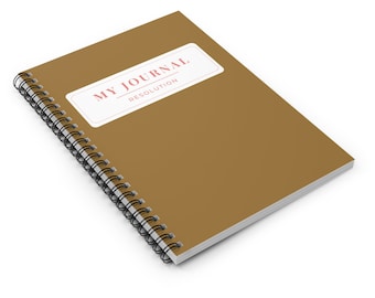 May include: A brown spiral bound journal with a white sticker that says "MY JOURNAL RESOLUTION" in pink lettering.