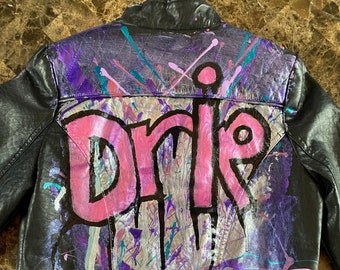 Girl's Drip Custom Moto Polyurethane Jacket. Made by Charlotte Russe.  Size Small.  This is authentically painted, not printed.