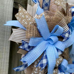 Side view of the wreath highlighting the full and fluffy bows.